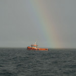 Tug and Rainbow Image