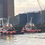 John McLoughlin on the water 2 boats